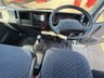 USED 1970 ISUZU TRUCKS GRAFTER N35.125T Twin Rear Wheel with Brit Tipp Driveaway Steel Floor Tipper 