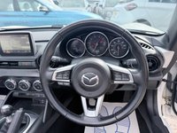 USED 2016 66 MAZDA MX-5 White 1.5 SKYACTIV-G convertible, 54,000 miles, Euro 6, Sat nav, Leather, Electric roof, 6-Speed manual, 16in Alloys, 7in Touchscreen ULEZ compliant. This stunning 2016 Mazda MX-5 1.5 SKYACTIV-G Icon Convertible is a fantastic example of one of the most iconic and enjoyable sports cars on the road today. Having had just two owners from new, this MX-5 has been well cared for throughout its life and offers the perfect combination of style, reliability, performance, and economy. Powered by Mazda's renowned 1.5 litre SKYACTIV-G petrol engine and paired with a smooth manual gearbox, it delivers an engaging driving experience with precise handling,