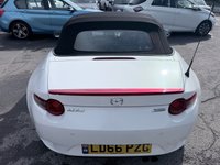 USED 2016 66 MAZDA MX-5 White 1.5 SKYACTIV-G convertible, 54,000 miles, Euro 6, Sat nav, Leather, Electric roof, 6-Speed manual, 16in Alloys, 7in Touchscreen ULEZ compliant. This stunning 2016 Mazda MX-5 1.5 SKYACTIV-G Icon Convertible is a fantastic example of one of the most iconic and enjoyable sports cars on the road today. Having had just two owners from new, this MX-5 has been well cared for throughout its life and offers the perfect combination of style, reliability, performance, and economy. Powered by Mazda's renowned 1.5 litre SKYACTIV-G petrol engine and paired with a smooth manual gearbox, it delivers an engaging driving experience with precise handling,