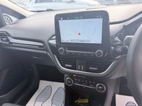 USED 2017 67 FORD FIESTA Grey 1.0T EcoBoost Titanium hatchback, 52,000 miles, Euro 6, ULEZ compliant, Sat Nav, CarPlay/Android Auto, Cruise, 16in alloys, A/C. This 2017 Ford Fiesta Titanium boasts exceptionally low mileage for its age, having covered just 52,000 miles. This popular hatchback is powered by an efficient 1.0 litre petrol engine, meeting Euro 6 emissions standards. The Titanium trim level ensures a well equipped driving experience, featuring the NCAP Pack for enhanced safety, including automatic headlights. Comfort is further assured with Electronic Automatic Temperature Control air conditioning, providing precise climate control. For sea