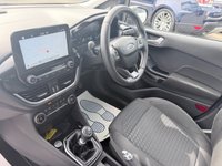 USED 2017 67 FORD FIESTA Grey 1.0T EcoBoost Titanium hatchback, 52,000 miles, Euro 6, ULEZ compliant, Sat Nav, CarPlay/Android Auto, Cruise, 16in alloys, A/C. This 2017 Ford Fiesta Titanium boasts exceptionally low mileage for its age, having covered just 52,000 miles. This popular hatchback is powered by an efficient 1.0 litre petrol engine, meeting Euro 6 emissions standards. The Titanium trim level ensures a well equipped driving experience, featuring the NCAP Pack for enhanced safety, including automatic headlights. Comfort is further assured with Electronic Automatic Temperature Control air conditioning, providing precise climate control. For sea