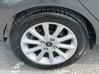 USED 2017 67 FORD FIESTA Grey 1.0T EcoBoost Titanium hatchback, 52,000 miles, Euro 6, ULEZ compliant, Sat Nav, CarPlay/Android Auto, Cruise, 16in alloys, A/C. This 2017 Ford Fiesta Titanium boasts exceptionally low mileage for its age, having covered just 52,000 miles. This popular hatchback is powered by an efficient 1.0 litre petrol engine, meeting Euro 6 emissions standards. The Titanium trim level ensures a well equipped driving experience, featuring the NCAP Pack for enhanced safety, including automatic headlights. Comfort is further assured with Electronic Automatic Temperature Control air conditioning, providing precise climate control. For sea