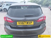 USED 2017 67 FORD FIESTA Grey 1.0T EcoBoost Titanium hatchback, 52,000 miles, Euro 6, ULEZ compliant, Sat Nav, CarPlay/Android Auto, Cruise, 16in alloys, A/C. This 2017 Ford Fiesta Titanium boasts exceptionally low mileage for its age, having covered just 52,000 miles. This popular hatchback is powered by an efficient 1.0 litre petrol engine, meeting Euro 6 emissions standards. The Titanium trim level ensures a well equipped driving experience, featuring the NCAP Pack for enhanced safety, including automatic headlights. Comfort is further assured with Electronic Automatic Temperature Control air conditioning, providing precise climate control. For sea
