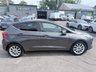 USED 2017 67 FORD FIESTA Grey 1.0T EcoBoost Titanium hatchback, 52,000 miles, Euro 6, ULEZ compliant, Sat Nav, CarPlay/Android Auto, Cruise, 16in alloys, A/C. This 2017 Ford Fiesta Titanium boasts exceptionally low mileage for its age, having covered just 52,000 miles. This popular hatchback is powered by an efficient 1.0 litre petrol engine, meeting Euro 6 emissions standards. The Titanium trim level ensures a well equipped driving experience, featuring the NCAP Pack for enhanced safety, including automatic headlights. Comfort is further assured with Electronic Automatic Temperature Control air conditioning, providing precise climate control. For sea