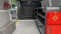 USED 2019 19 FORD TRANSIT CUSTOM L1 H1 Tdci 105 PS SWB 320 With Air Conditioning, Electric Windows, Cruise Control, Parkinf Sensors, Speed Limiter 70 MPH, Internal Racking, RooF rack in great condition . 1 Owner from New - 4 Service Stamps in the service book . Presenting the Ford Transit Custom L1 H1, a short wheelbase 320 variant finished in great condition and powered by the dependable 105 PS 2.0-litre TDCi diesel engine. This van has had just one owner from new and comes with a fully stamped service book showing four service records. The specification is tailored for practical daily use, including air conditioning, electric windows, cruise control, parking sensors, a 70 mph speed limiter, internal racking for secure load organisation, and a roof rack for additional carrying capacity. A well-maintained, owner-from-new Transit Custom ready for immediate professional operation.  