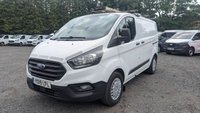 USED 2019 19 FORD TRANSIT CUSTOM L1 H1 Tdci 105 PS SWB 320 With Air Conditioning, Electric Windows, Cruise Control, Parkinf Sensors, Speed Limiter 70 MPH, Internal Racking, RooF rack in great condition . 1 Owner from New - 4 Service Stamps in the service book . Presenting the Ford Transit Custom L1 H1, a short wheelbase 320 variant finished in great condition and powered by the dependable 105 PS 2.0-litre TDCi diesel engine. This van has had just one owner from new and comes with a fully stamped service book showing four service records. The specification is tailored for practical daily use, including air conditioning, electric windows, cruise control, parking sensors, a 70 mph speed limiter, internal racking for secure load organisation, and a roof rack for additional carrying capacity. A well-maintained, owner-from-new Transit Custom ready for immediate professional operation.  