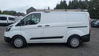 USED 2019 19 FORD TRANSIT CUSTOM L1 H1 Tdci 105 PS SWB 320 With Air Conditioning, Electric Windows, Cruise Control, Parkinf Sensors, Speed Limiter 70 MPH, Internal Racking, RooF rack in great condition . 1 Owner from New - 4 Service Stamps in the service book . Presenting the Ford Transit Custom L1 H1, a short wheelbase 320 variant finished in great condition and powered by the dependable 105 PS 2.0-litre TDCi diesel engine. This van has had just one owner from new and comes with a fully stamped service book showing four service records. The specification is tailored for practical daily use, including air conditioning, electric windows, cruise control, parking sensors, a 70 mph speed limiter, internal racking for secure load organisation, and a roof rack for additional carrying capacity. A well-maintained, owner-from-new Transit Custom ready for immediate professional operation.  