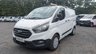 USED 2019 19 FORD TRANSIT CUSTOM L1 H1 Tdci 105 PS SWB 320 With Air Conditioning, Electric Windows, Cruise Control, Parkinf Sensors, Speed Limiter 70 MPH, Internal Racking, RooF rack in great condition . 1 Owner from New - 4 Service Stamps in the service book . Presenting the Ford Transit Custom L1 H1, a short wheelbase 320 variant finished in great condition and powered by the dependable 105 PS 2.0-litre TDCi diesel engine. This van has had just one owner from new and comes with a fully stamped service book showing four service records. The specification is tailored for practical daily use, including air conditioning, electric windows, cruise control, parking sensors, a 70 mph speed limiter, internal racking for secure load organisation, and a roof rack for additional carrying capacity. A well-maintained, owner-from-new Transit Custom ready for immediate professional operation.  