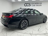 USED 2022 22 BMW 7 SERIES 3.0 730d MHT M Sport Saloon 4dr Diesel Hybrid Auto Euro 6 (s/s) (286 ps) Finished In Black Sapphire, This 7 Series Comes With The M Sport Pro Package, Full BMW Service History, 20" M Light Star Spoke Alloy Wheels, Sun Protection Glazing, Front And Rear Memory Seats, Harman Kardon Premium Sound System, Front And Rear Heated Seats, 360 Degree Surround Camera, Park Assist, Power Operated Tailgate, 2 Keys, 12 Months MOT, 3 Months Warranty. Finance And Extended Warranty Available.