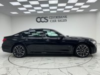 USED 2022 22 BMW 7 SERIES 3.0 730d MHT M Sport Saloon 4dr Diesel Hybrid Auto Euro 6 (s/s) (286 ps) Finished In Black Sapphire, This 7 Series Comes With The M Sport Pro Package, Full BMW Service History, 20" M Light Star Spoke Alloy Wheels, Sun Protection Glazing, Front And Rear Memory Seats, Harman Kardon Premium Sound System, Front And Rear Heated Seats, 360 Degree Surround Camera, Park Assist, Power Operated Tailgate, 2 Keys, 12 Months MOT, 3 Months Warranty. Finance And Extended Warranty Available.