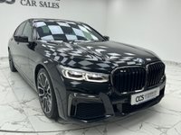 USED 2022 22 BMW 7 SERIES 3.0 730d MHT M Sport Saloon 4dr Diesel Hybrid Auto Euro 6 (s/s) (286 ps) Finished In Black Sapphire, This 7 Series Comes With The M Sport Pro Package, Full BMW Service History, 20" M Light Star Spoke Alloy Wheels, Sun Protection Glazing, Front And Rear Memory Seats, Harman Kardon Premium Sound System, Front And Rear Heated Seats, 360 Degree Surround Camera, Park Assist, Power Operated Tailgate, 2 Keys, 12 Months MOT, 3 Months Warranty. Finance And Extended Warranty Available.