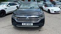 USED 2019 19 VOLKSWAGEN TOUAREG 3.0 TDI V6 R-Line Tech SUV 5dr Diesel Tiptronic 4Motion Euro 6 (s/s) (286 ps)in metallic blue/black with only 1 owner and a full main dealer service history along with a great spec... This 2019 Volkswagen Touareg TDI V6 R Line Tech is a superb example, having been owned by just one careful keeper. With a full Volkswagen service history with a full service record printout. This premium SUV boasts a powerful 3.0 litre diesel engine, paired with a smooth automatic transmission and Volkswagen's renowned four wheel drive system, ensuring confident performance in all conditions. As a Euro 6 compliant vehicle, it meets stringent emission standards. The R Line Tech trim level signifi