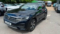 USED 2019 19 VOLKSWAGEN TOUAREG 3.0 TDI V6 R-Line Tech SUV 5dr Diesel Tiptronic 4Motion Euro 6 (s/s) (286 ps)in metallic blue/black with only 1 owner and a full main dealer service history along with a great spec... This 2019 Volkswagen Touareg TDI V6 R Line Tech is a superb example, having been owned by just one careful keeper. With a full Volkswagen service history with a full service record printout. This premium SUV boasts a powerful 3.0 litre diesel engine, paired with a smooth automatic transmission and Volkswagen's renowned four wheel drive system, ensuring confident performance in all conditions. As a Euro 6 compliant vehicle, it meets stringent emission standards. The R Line Tech trim level signifi