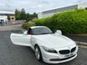 USED 2011 61 BMW Z4 2.5 23i Highline Edition Convertible 2dr Petrol Manual sDrive Euro 5 (204 ps)-Factory Extras Worth �&pound;1,690-Fantastic Low Mileage Example-Finished In Alpine White With Coral Red Dakota Leather Upholstery-2 Former Keepers-Last Keeper Since July 2015. 