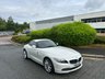 USED 2011 61 BMW Z4 2.5 23i Highline Edition Convertible 2dr Petrol Manual sDrive Euro 5 (204 ps)-Factory Extras Worth �&pound;1,690-Fantastic Low Mileage Example-Finished In Alpine White With Coral Red Dakota Leather Upholstery-2 Former Keepers-Last Keeper Since July 2015. 