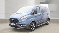 USED 2021 21 FORD TRANSIT CUSTOM Crew Van Double Cab Active Automatic Tdci 170 PS L1 H1 320 With Air Conditioning, Sat Nav, Reverse Camera, Electric Pack, Alloy Wheels, Running Boards, Tailgate, Bulkhead and Ply Lining finished in Chrome Blue in great condition. Service History . Make yor next van purchase in a colour . Upgrade your fleet or business transport with a Ford Transit Custom Crew Van Active, finished in a standout Chrome Blue. This L1 H1 Double Cab combines commercial practicality with executive-level specification. Powered by a responsive 170 PS TDCi engine mated to an automatic transmission, it delivers effortless torque and a refined drive. The van is in great condition and comes with a full service history, confirming its meticulous maintenance record.  Designed for both team transport and cargo, the double cab layout features a full bulkhead and a professionally fitted ply lining, protecting the load area from daily wear. The tailgate provides easy access, while air conditioning, satellite navigation, and a reverse camera make every journey safer and more comfortable. The electric pack, alloy wheels, and running boards enhance both usability and presence. Make your next van purchase in a colour that stands out for the right reasons. Contact us today to view this exceptional example. 