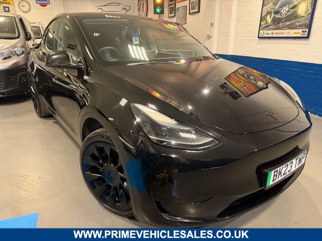 View our Tesla Model Y Auto RWD Electric 