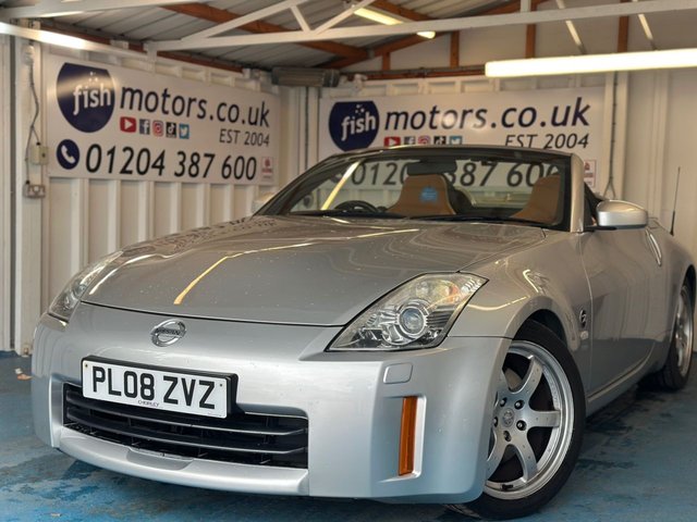 View our Nissan 350 Z 3.5 V6 GT Convertible 2dr Petrol Manual (288 g/km, 296 bhp)+2 KEYS+2 FORMER KEEPERS+NAV+FULL LEATHER HEATED SEATS+12 SERVICE STAMPS+ALLOYS+FOLDING MIRRORS+VERY RARE CAR+CLIMATE+CRUISE+