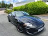 USED 2011 11 JAGUAR XKR 5.0 V8 Coupe 2dr Petrol Auto Euro 5 (510 ps)-Fantastic Example, Finished In Stratus Grey Metallic With Heated Ivory Leather Upholstery.3 Former Keepers-Last Keeper Since June 2016-Fitted With a Speed Pack.The 2011 Jaguar XKR Speed Pack is an optional performance and styling upgrade package for the supercharged Jaguar XKR Coupe. It unlocked a higher top speed and added a factory aerodynamic body kit to improve high-speed stability. 