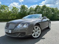 USED 2010 60 BENTLEY CONTINENTAL 6.0L 2d  AUTO  552 BHP SOMETHING RATHER SPECIAL, JUST ARRIVED ON SITE+FINISHED IN A BEAUTIFUL METALLIC GREY PAINT+CONVERTIBLE+LOADED WITH EXTRAS+GREAT SERVICE HISTORY+ULEZ COMPLIANT+FULL LEATHER INTERIOR+SATELLITE NAVIGATION+PARK ASSIST+CLIMATE CONTROL+20 INCH ALLOY WHEELS+CALL TODAY FOR FURTHER INFORMATION AND TO BOOK A VIEWING WITH ONE OF OUR EXPERIENCED SALES ADVISORS+READY TO DRIVE AWAY TODAY!!!!!!!!!!!!!!!!!!!!!!!!!!!!