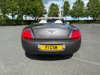USED 2010 60 BENTLEY CONTINENTAL 6.0L 2d  AUTO  552 BHP SOMETHING RATHER SPECIAL, JUST ARRIVED ON SITE+FINISHED IN A BEAUTIFUL METALLIC GREY PAINT+CONVERTIBLE+LOADED WITH EXTRAS+GREAT SERVICE HISTORY+ULEZ COMPLIANT+FULL LEATHER INTERIOR+SATELLITE NAVIGATION+PARK ASSIST+CLIMATE CONTROL+20 INCH ALLOY WHEELS+CALL TODAY FOR FURTHER INFORMATION AND TO BOOK A VIEWING WITH ONE OF OUR EXPERIENCED SALES ADVISORS+READY TO DRIVE AWAY TODAY!!!!!!!!!!!!!!!!!!!!!!!!!!!!