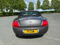 USED 2010 60 BENTLEY CONTINENTAL 6.0L 2d  AUTO  552 BHP SOMETHING RATHER SPECIAL, JUST ARRIVED ON SITE+FINISHED IN A BEAUTIFUL METALLIC GREY PAINT+CONVERTIBLE+LOADED WITH EXTRAS+GREAT SERVICE HISTORY+ULEZ COMPLIANT+FULL LEATHER INTERIOR+SATELLITE NAVIGATION+PARK ASSIST+CLIMATE CONTROL+20 INCH ALLOY WHEELS+CALL TODAY FOR FURTHER INFORMATION AND TO BOOK A VIEWING WITH ONE OF OUR EXPERIENCED SALES ADVISORS+READY TO DRIVE AWAY TODAY!!!!!!!!!!!!!!!!!!!!!!!!!!!!