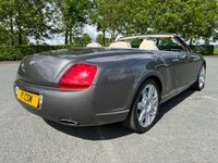 USED 2010 60 BENTLEY CONTINENTAL 6.0L 2d  AUTO  552 BHP SOMETHING RATHER SPECIAL, JUST ARRIVED ON SITE+FINISHED IN A BEAUTIFUL METALLIC GREY PAINT+CONVERTIBLE+LOADED WITH EXTRAS+GREAT SERVICE HISTORY+ULEZ COMPLIANT+FULL LEATHER INTERIOR+SATELLITE NAVIGATION+PARK ASSIST+CLIMATE CONTROL+20 INCH ALLOY WHEELS+CALL TODAY FOR FURTHER INFORMATION AND TO BOOK A VIEWING WITH ONE OF OUR EXPERIENCED SALES ADVISORS+READY TO DRIVE AWAY TODAY!!!!!!!!!!!!!!!!!!!!!!!!!!!!