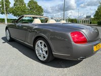 USED 2010 60 BENTLEY CONTINENTAL 6.0L 2d  AUTO  552 BHP SOMETHING RATHER SPECIAL, JUST ARRIVED ON SITE+FINISHED IN A BEAUTIFUL METALLIC GREY PAINT+CONVERTIBLE+LOADED WITH EXTRAS+GREAT SERVICE HISTORY+ULEZ COMPLIANT+FULL LEATHER INTERIOR+SATELLITE NAVIGATION+PARK ASSIST+CLIMATE CONTROL+20 INCH ALLOY WHEELS+CALL TODAY FOR FURTHER INFORMATION AND TO BOOK A VIEWING WITH ONE OF OUR EXPERIENCED SALES ADVISORS+READY TO DRIVE AWAY TODAY!!!!!!!!!!!!!!!!!!!!!!!!!!!!