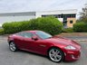 USED 2014 14 JAGUAR XK 5.0 V8 Signature Coupe 2dr Petrol Auto Euro 5 (385 ps)-Great Example, Finished In Italian Racing Red Metallic-Heated Ivory Leather Upholstery-2 Owner Car From New-Last Keeper Since August 2022-The 2014 Jaguar XK Signature Edition is a highly exclusive, final-run special edition that Jaguar released to commemorate the final year of the X150-generation XK grand tourer. Built as a luxury-focused farewell model, only 400 examples were allocated for the UK market, making it a highly desirable modern classic for collectors and grand touring enthusiasts alike. 