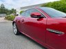USED 2014 14 JAGUAR XK 5.0 V8 Signature Coupe 2dr Petrol Auto Euro 5 (385 ps)-Great Example, Finished In Italian Racing Red Metallic-Heated Ivory Leather Upholstery-2 Owner Car From New-Last Keeper Since August 2022-The 2014 Jaguar XK Signature Edition is a highly exclusive, final-run special edition that Jaguar released to commemorate the final year of the X150-generation XK grand tourer. Built as a luxury-focused farewell model, only 400 examples were allocated for the UK market, making it a highly desirable modern classic for collectors and grand touring enthusiasts alike. 