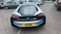 USED 2015 E BMW I8 Silver 1.5 7.1kWh Plug-in hybrid coupe, 49,050 miles, ULEZ compliant, Automatic 4WD, 20in alloys, HK audio, Sat nav, Camera, Cruise, 8.8in Display. This 2015 BMW i8 presents a remarkable opportunity with exceptionally low mileage for its age, having covered just 49,050 miles. This impressive plug in hybrid sports car features a 1.5 litre petrol engine and four wheel drive, meeting Euro 6 emission standards. It comes with a 3 month warranty for your peace of mind, and its MOT is valid until March 2027. Notable features include striking 20 inch BMW i Turbine Spoke Style 625 alloy wheels, a comprehensive Driving Assistant system, and eye catch