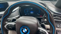 USED 2015 E BMW I8 Silver 1.5 7.1kWh Plug-in hybrid coupe, 49,050 miles, ULEZ compliant, Automatic 4WD, 20in alloys, HK audio, Sat nav, Camera, Cruise, 8.8in Display. This 2015 BMW i8 presents a remarkable opportunity with exceptionally low mileage for its age, having covered just 49,050 miles. This impressive plug in hybrid sports car features a 1.5 litre petrol engine and four wheel drive, meeting Euro 6 emission standards. It comes with a 3 month warranty for your peace of mind, and its MOT is valid until March 2027. Notable features include striking 20 inch BMW i Turbine Spoke Style 625 alloy wheels, a comprehensive Driving Assistant system, and eye catch