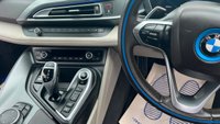 USED 2015 E BMW I8 Silver 1.5 7.1kWh Plug-in hybrid coupe, 49,050 miles, ULEZ compliant, Automatic 4WD, 20in alloys, HK audio, Sat nav, Camera, Cruise, 8.8in Display. This 2015 BMW i8 presents a remarkable opportunity with exceptionally low mileage for its age, having covered just 49,050 miles. This impressive plug in hybrid sports car features a 1.5 litre petrol engine and four wheel drive, meeting Euro 6 emission standards. It comes with a 3 month warranty for your peace of mind, and its MOT is valid until March 2027. Notable features include striking 20 inch BMW i Turbine Spoke Style 625 alloy wheels, a comprehensive Driving Assistant system, and eye catch