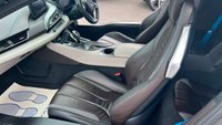USED 2015 E BMW I8 Silver 1.5 7.1kWh Plug-in hybrid coupe, 49,050 miles, ULEZ compliant, Automatic 4WD, 20in alloys, HK audio, Sat nav, Camera, Cruise, 8.8in Display. This 2015 BMW i8 presents a remarkable opportunity with exceptionally low mileage for its age, having covered just 49,050 miles. This impressive plug in hybrid sports car features a 1.5 litre petrol engine and four wheel drive, meeting Euro 6 emission standards. It comes with a 3 month warranty for your peace of mind, and its MOT is valid until March 2027. Notable features include striking 20 inch BMW i Turbine Spoke Style 625 alloy wheels, a comprehensive Driving Assistant system, and eye catch