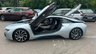 USED 2015 E BMW I8 Silver 1.5 7.1kWh Plug-in hybrid coupe, 49,050 miles, ULEZ compliant, Automatic 4WD, 20in alloys, HK audio, Sat nav, Camera, Cruise, 8.8in Display. This 2015 BMW i8 presents a remarkable opportunity with exceptionally low mileage for its age, having covered just 49,050 miles. This impressive plug in hybrid sports car features a 1.5 litre petrol engine and four wheel drive, meeting Euro 6 emission standards. It comes with a 3 month warranty for your peace of mind, and its MOT is valid until March 2027. Notable features include striking 20 inch BMW i Turbine Spoke Style 625 alloy wheels, a comprehensive Driving Assistant system, and eye catch