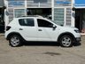 USED 2015 15 DACIA SANDERO STEPWAY 0.9 TCe Laureate Hatchback 5dr Petrol Manual Euro 5 (90 ps) Finished in GLACIER WHITE with Cloth Trim. This Dacia Sandero is an incredibly practical and budget-friendly crossover hatchback. The Laur&eacute;ate trim is a highly desirable premium trim. Features include, Sat Nav, Touch Screen, Rear Park Sensors, Radio, B/Tooth and much more. Dealer serviced at 16773 miles, 18756 miles, 27656 miles, 33419 miles, 39871 miles, 41242 miles, 43007 miles, and at 44804 miles.