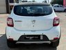 USED 2015 15 DACIA SANDERO STEPWAY 0.9 TCe Laureate Hatchback 5dr Petrol Manual Euro 5 (90 ps) Finished in GLACIER WHITE with Cloth Trim. This Dacia Sandero is an incredibly practical and budget-friendly crossover hatchback. The Laur&eacute;ate trim is a highly desirable premium trim. Features include, Sat Nav, Touch Screen, Rear Park Sensors, Radio, B/Tooth and much more. Dealer serviced at 16773 miles, 18756 miles, 27656 miles, 33419 miles, 39871 miles, 41242 miles, 43007 miles, and at 44804 miles.