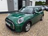 USED 2023 23 MINI HATCH 1.5 Cooper Classic Hatchback 3dr Petrol Steptronic Euro 6 (s/s) (136 ps) ONE OWNER+AUTOMATIC+ONLY 27,714 MILES+SERVICE HISTORY CONSISTS OF X5 SERVICES, LAST @27,592 MILES-02.04.2026+8.8 INCH TOUCHSCREEN WITH LED RING+BLUETOOTH+HEATED SEATS+AUTOMATIC HEADLIGHT ACTIVATION+RAIN-SENSING WINDSCREEN WIPERS+'BRITISH RACING GREEN' PAINT+15 INCH ALLOY WHEELS.