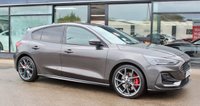 PRE-OWNED 2023 72 FORD FOCUS 2.3T EcoBoost ST Hatchback 5dr Petrol Manual Euro 6 (s/s) (280 ps) Magnetic Grey Metallic (&pound;725 option), Black Sensico Interior With Red Stitching, 19" Alloy Wheels, Ford Performance Pack (&pound;850 option), 6 Way Electric Adjustable Seats, SYNC4 Satellite Navigation With 13.2in Screen, Auto headlights, Hill Start Assist, Lane Keeping Assist, Launch Control and Rev Matching, Front and Rear parking Sensors, Electric Folding Mirrors, Parking Camera, Heated Seats, Cruise Control, Keyless Entry and Start, Quick Clear Heated Windscreen, Privacy Glass, Red Brake ISOFIX, W