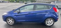 USED 2017 66 FORD FIESTA 1.25 Zetec Hatchback 5dr Petrol Manual Euro 6 (82 ps) SAT NAV AND BLUETOOTH! LONG MOT, HPI CLEAR, ONLY 1 PREVIOUS OWNER, GENUINE LOW MILEAGE FROM NEW, EXCELLENT CONDITION BOTH INSIDE AND OUT! AIR CON, ALLOYS, HEATED FRONT/REAR WINDSCREENS, ELECTRIC WINDOWS