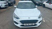 USED 2020 70 FORD FOCUS 1.5 EcoBlue ST-Line Hatchback 5dr Diesel Manual Euro 6 (s/s) (120 ps) in white with only 2 owners and a full service history in lovely condition. This 2020 Ford Focus ST Line offers a compelling blend of sporty styling and efficient diesel performance.  Powered by a 1.5 litre Euro 6 compliant diesel engine with a full service history with 5 service stamps, this ST Line variant is designed for those who appreciate a dynamic driving experience without compromising on economy.  Its registration year of 2020 places it within a modern generation of the Focus, known for its refined handling and comfortable interior.  The ST Line trim level sign