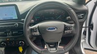 USED 2020 70 FORD FOCUS 1.5 EcoBlue ST-Line Hatchback 5dr Diesel Manual Euro 6 (s/s) (120 ps) in white with only 2 owners and a full service history in lovely condition. This 2020 Ford Focus ST Line offers a compelling blend of sporty styling and efficient diesel performance.  Powered by a 1.5 litre Euro 6 compliant diesel engine with a full service history with 5 service stamps, this ST Line variant is designed for those who appreciate a dynamic driving experience without compromising on economy.  Its registration year of 2020 places it within a modern generation of the Focus, known for its refined handling and comfortable interior.  The ST Line trim level sign