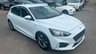 USED 2020 70 FORD FOCUS 1.5 EcoBlue ST-Line Hatchback 5dr Diesel Manual Euro 6 (s/s) (120 ps) in white with only 2 owners and a full service history in lovely condition. This 2020 Ford Focus ST Line offers a compelling blend of sporty styling and efficient diesel performance.  Powered by a 1.5 litre Euro 6 compliant diesel engine with a full service history with 5 service stamps, this ST Line variant is designed for those who appreciate a dynamic driving experience without compromising on economy.  Its registration year of 2020 places it within a modern generation of the Focus, known for its refined handling and comfortable interior.  The ST Line trim level sign