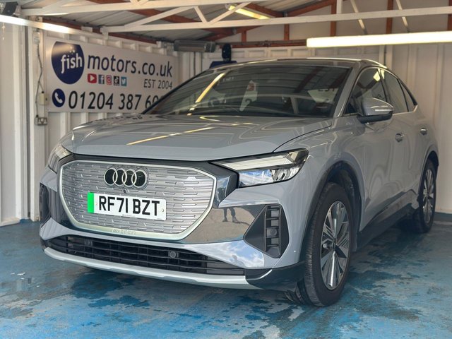 View our Audi Q4 E-Tron 35 Sport Sportback 5dr Electric Auto 55kWh (170 ps)+2 CABLES+1 OWNER FROM NEW+NAV+HISTORY+PARK CONTROL+CLIMATE+ALLOYS+LED LIGHTS+COMFORT PACK AND SOUND PACK+DIGITAL COCKPIT+MEDIA+BLUETOOTH+SPORTS SEATS+CRUISE+HEATED FRONT SEATS+