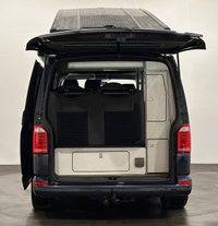 USED 2019 19 VOLKSWAGEN CAMPER 2.0 TDI T32 BlueMotion Tech Highline Kombi Double Cab 5dr Diesel DSG FWD SWB Euro 6 (s/s) (150 ps) Hosting an extremely well equipped bespke conversion from the acclaimed Wirral Custom Campers Skyline Pop Top Roof, Scenic canvas , Vanshades , Passenger double base swivel seat, Eberspacher heater, 150 watt solar panel, led interior lighting , 240 Hook up electrics, leisure pack, usb ports, 2 240 sockets, smart charge system , Smeg 9722 sink, 10 litre water tank, Evo kitchen waeco fridge / freezer, over head lockers, smeg oven / grill 4 bert rock /  roll bed , 30 litre water storage tank,