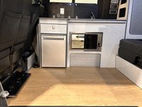 USED 2019 19 VOLKSWAGEN CAMPER 2.0 TDI T32 BlueMotion Tech Highline Kombi Double Cab 5dr Diesel DSG FWD SWB Euro 6 (s/s) (150 ps) Hosting an extremely well equipped bespke conversion from the acclaimed Wirral Custom Campers Skyline Pop Top Roof, Scenic canvas , Vanshades , Passenger double base swivel seat, Eberspacher heater, 150 watt solar panel, led interior lighting , 240 Hook up electrics, leisure pack, usb ports, 2 240 sockets, smart charge system , Smeg 9722 sink, 10 litre water tank, Evo kitchen waeco fridge / freezer, over head lockers, smeg oven / grill 4 bert rock /  roll bed , 30 litre water storage tank,