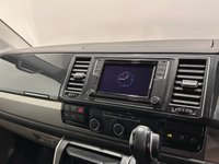 USED 2019 19 VOLKSWAGEN CAMPER 2.0 TDI T32 BlueMotion Tech Highline Kombi Double Cab 5dr Diesel DSG FWD SWB Euro 6 (s/s) (150 ps) Hosting an extremely well equipped bespke conversion from the acclaimed Wirral Custom Campers Skyline Pop Top Roof, Scenic canvas , Vanshades , Passenger double base swivel seat, Eberspacher heater, 150 watt solar panel, led interior lighting , 240 Hook up electrics, leisure pack, usb ports, 2 240 sockets, smart charge system , Smeg 9722 sink, 10 litre water tank, Evo kitchen waeco fridge / freezer, over head lockers, smeg oven / grill 4 bert rock /  roll bed , 30 litre water storage tank,