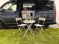 USED 2019 19 VOLKSWAGEN CAMPER 2.0 TDI T32 BlueMotion Tech Highline Kombi Double Cab 5dr Diesel DSG FWD SWB Euro 6 (s/s) (150 ps) Hosting an extremely well equipped bespke conversion from the acclaimed Wirral Custom Campers Skyline Pop Top Roof, Scenic canvas , Vanshades , Passenger double base swivel seat, Eberspacher heater, 150 watt solar panel, led interior lighting , 240 Hook up electrics, leisure pack, usb ports, 2 240 sockets, smart charge system , Smeg 9722 sink, 10 litre water tank, Evo kitchen waeco fridge / freezer, over head lockers, smeg oven / grill 4 bert rock /  roll bed , 30 litre water storage tank,