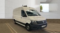 USED 2021 21 VOLKSWAGEN CRAFTER Trendline MWB High Roof CR35 Tdi 102 PS With Air Conditioning, Electric Windows, Parking Sensors, Criose control, Internal racking, Roof Rack and Side Loading door in great condition. 1 Owner from new - 4 Service stamps in the book . This is a genuine commercial opportunity to acquire a highly specified 21 plate Volkswagen Crafter Trendline in medium wheelbase, high roof configuration. Finished in a professional commercial colour, this van presents in great condition throughout and offers an exceptional specification list that is rarely found in a single vehicle at this price point.  The factory-fitted Trendline trim elevates this Crafter well beyond a standard workhorse. Air conditioning ensures cabin comfort during long shifts or warm weather, while electric windows and cruise control make motorway miles effortless and relaxed. The inclusion of front and rear parking sensors takes the stress out of tight urban manoeuvres, protecting both your vehicle and those around you.  This particular van has been carefully specified for immediate productive use. It benefits from professionally installed internal racking, providing secure and organised storage for tools, equipment, or stock. A robust roof rack adds further load-carrying flexibility, while the side loading door offers excellent accessibility for urban deliveries or site work where rear access is restricted. The combination of these features means this Crafter is ready to earn its keep from day one.  Under the bonnet lies the proven 2.0-litre TDI engine producing 102 PS, delivering dependable and efficient performance suited to both city driving and longer hauls. The CR35 designation confirms a gross vehicle weight of 3.5 tonnes, keeping this van within standard car licence requirements while offering a substantial payload capacity.  The service history is a standout feature of this offering. Supplied new to just one owner from new, the vehicle has been meticulously maintained with four service stamps recorded in the service book. This consistent maintenance schedule provides genuine peace of mind and demonstrates the care this van has received throughout its life. The condition reflects this careful ownership, with the bodywork, cab interior, and load area all presenting very well for a working vehicle.  This Crafter represents an intelligent purchase for any sole trader, fleet operator, or business looking to expand or upgrade their commercial fleet. The high specification, factory options, and documented service history make this a van that stands apart from the average used commercial vehicle. It requires no immediate preparation and is ready to be driven away and put straight to work. Viewing is highly recommended to appreciate the condition and specification on offer. For further details, including a full walk-around video and service record verification, please contact the sales team directly. Competitive finance packages and part-exchange options are available. Do not delay, as a van of this calibre in this condition will not remain available for long. 