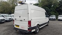 USED 2021 21 VOLKSWAGEN CRAFTER Trendline MWB High Roof CR35 Tdi 102 PS With Air Conditioning, Electric Windows, Parking Sensors, Criose control, Internal racking, Roof Rack and Side Loading door in great condition. 1 Owner from new - 4 Service stamps in the book . This is a genuine commercial opportunity to acquire a highly specified 21 plate Volkswagen Crafter Trendline in medium wheelbase, high roof configuration. Finished in a professional commercial colour, this van presents in great condition throughout and offers an exceptional specification list that is rarely found in a single vehicle at this price point.  The factory-fitted Trendline trim elevates this Crafter well beyond a standard workhorse. Air conditioning ensures cabin comfort during long shifts or warm weather, while electric windows and cruise control make motorway miles effortless and relaxed. The inclusion of front and rear parking sensors takes the stress out of tight urban manoeuvres, protecting both your vehicle and those around you.  This particular van has been carefully specified for immediate productive use. It benefits from professionally installed internal racking, providing secure and organised storage for tools, equipment, or stock. A robust roof rack adds further load-carrying flexibility, while the side loading door offers excellent accessibility for urban deliveries or site work where rear access is restricted. The combination of these features means this Crafter is ready to earn its keep from day one.  Under the bonnet lies the proven 2.0-litre TDI engine producing 102 PS, delivering dependable and efficient performance suited to both city driving and longer hauls. The CR35 designation confirms a gross vehicle weight of 3.5 tonnes, keeping this van within standard car licence requirements while offering a substantial payload capacity.  The service history is a standout feature of this offering. Supplied new to just one owner from new, the vehicle has been meticulously maintained with four service stamps recorded in the service book. This consistent maintenance schedule provides genuine peace of mind and demonstrates the care this van has received throughout its life. The condition reflects this careful ownership, with the bodywork, cab interior, and load area all presenting very well for a working vehicle.  This Crafter represents an intelligent purchase for any sole trader, fleet operator, or business looking to expand or upgrade their commercial fleet. The high specification, factory options, and documented service history make this a van that stands apart from the average used commercial vehicle. It requires no immediate preparation and is ready to be driven away and put straight to work. Viewing is highly recommended to appreciate the condition and specification on offer. For further details, including a full walk-around video and service record verification, please contact the sales team directly. Competitive finance packages and part-exchange options are available. Do not delay, as a van of this calibre in this condition will not remain available for long. 
